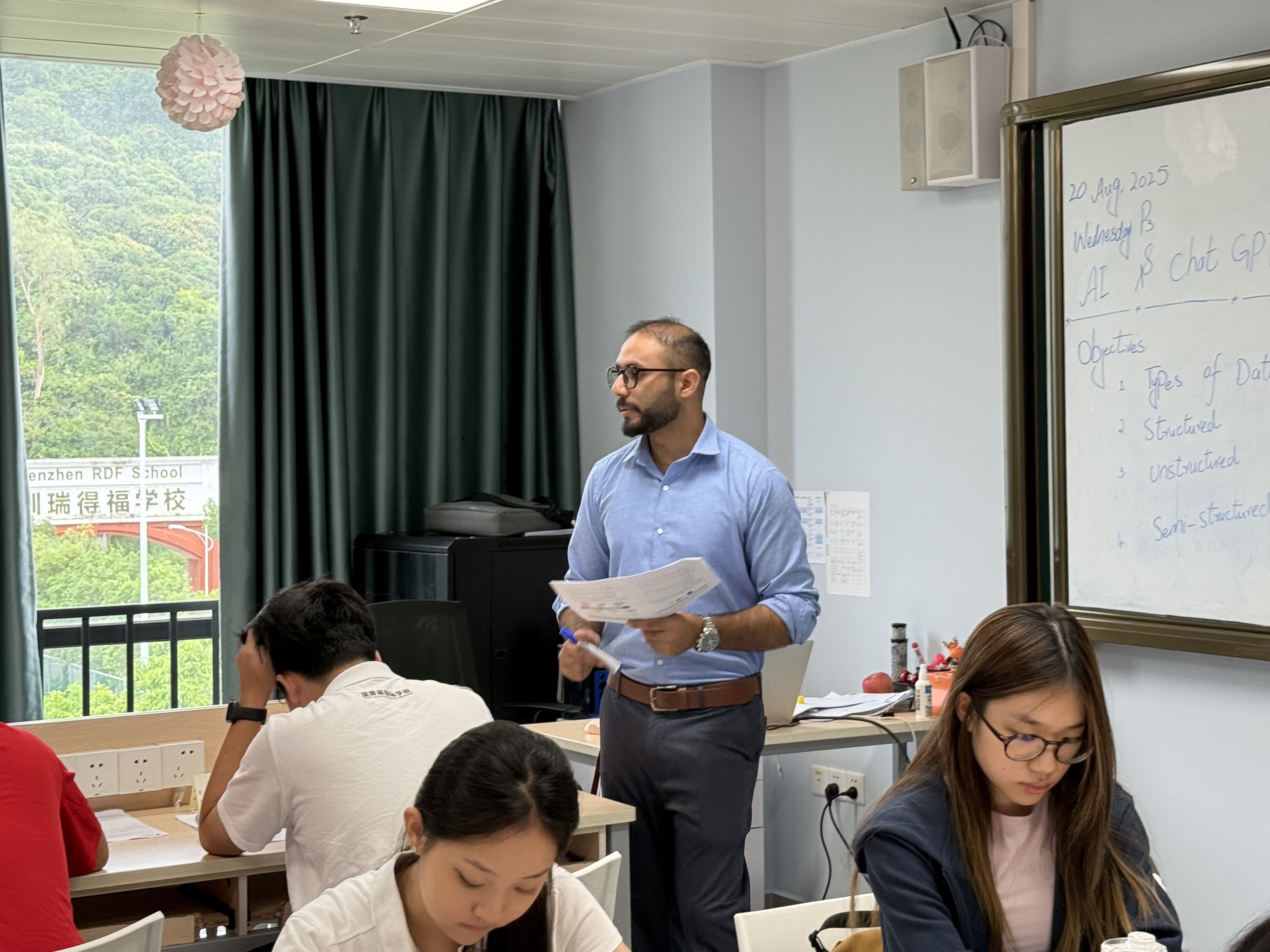 Aqib leading a group discussion